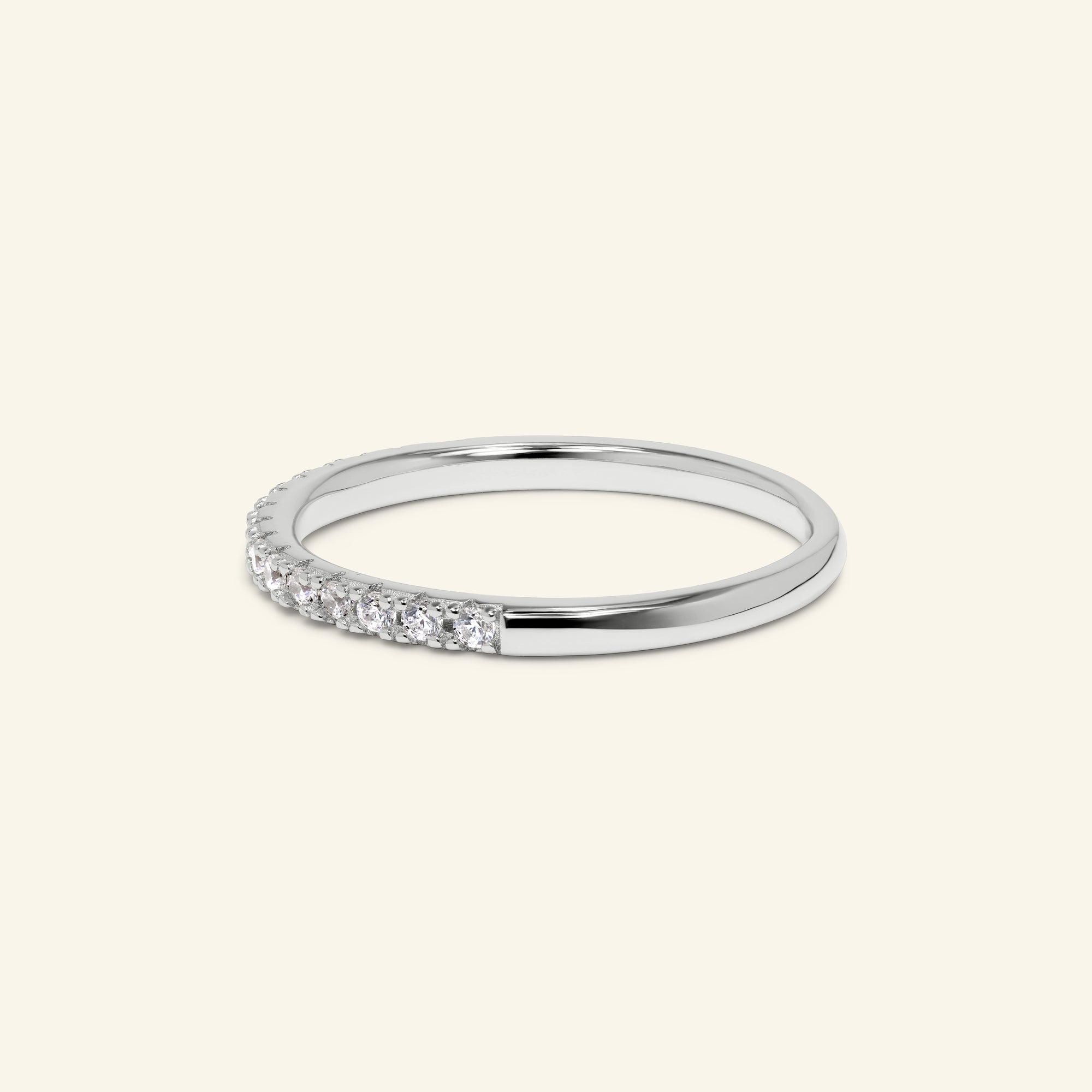 Elara pavé band with round stones in sterling silver available in yellow or silver finish by Arvion Jewelry