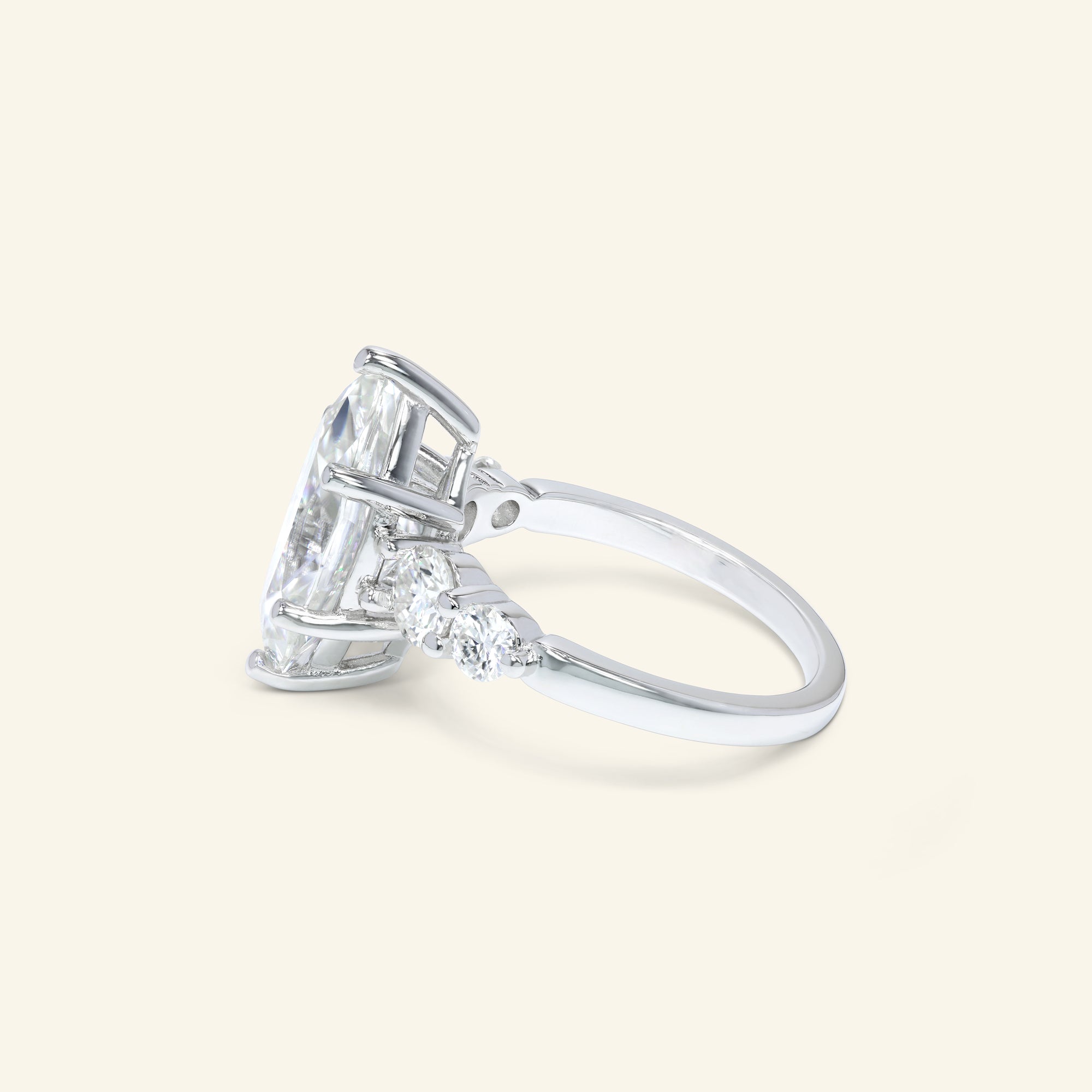 Mia marquise ring with graduated round side stones in polished sterling silver by Arvion Jewelry