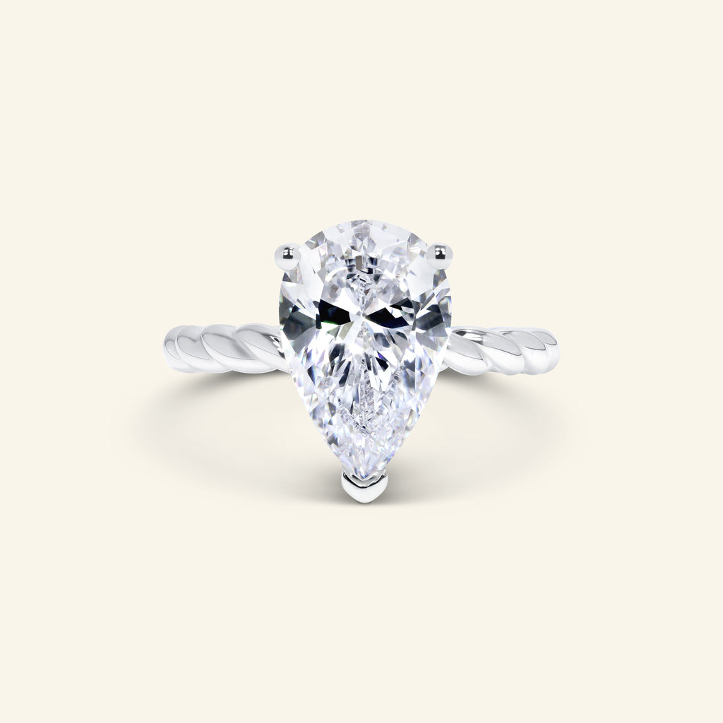 Aera Pear cut solitaire ring with twisted rope band design by Arvion Jewelry