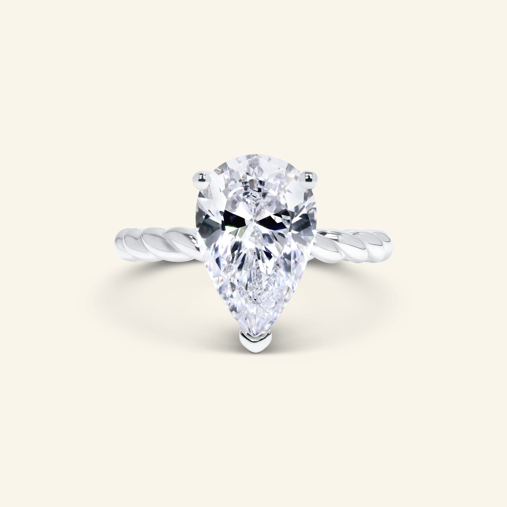 Aera Pear cut solitaire ring with twisted rope band design by Arvion Jewelry