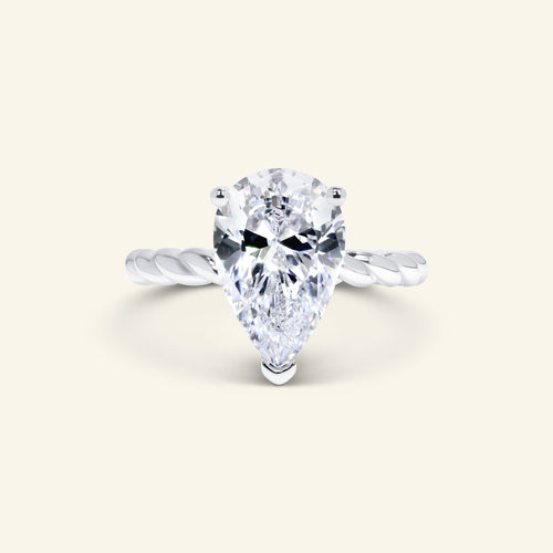 Aera Pear cut solitaire ring with twisted rope band design by Arvion Jewelry