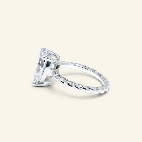 Aera Pear cut solitaire ring with twisted rope band design by Arvion Jewelry