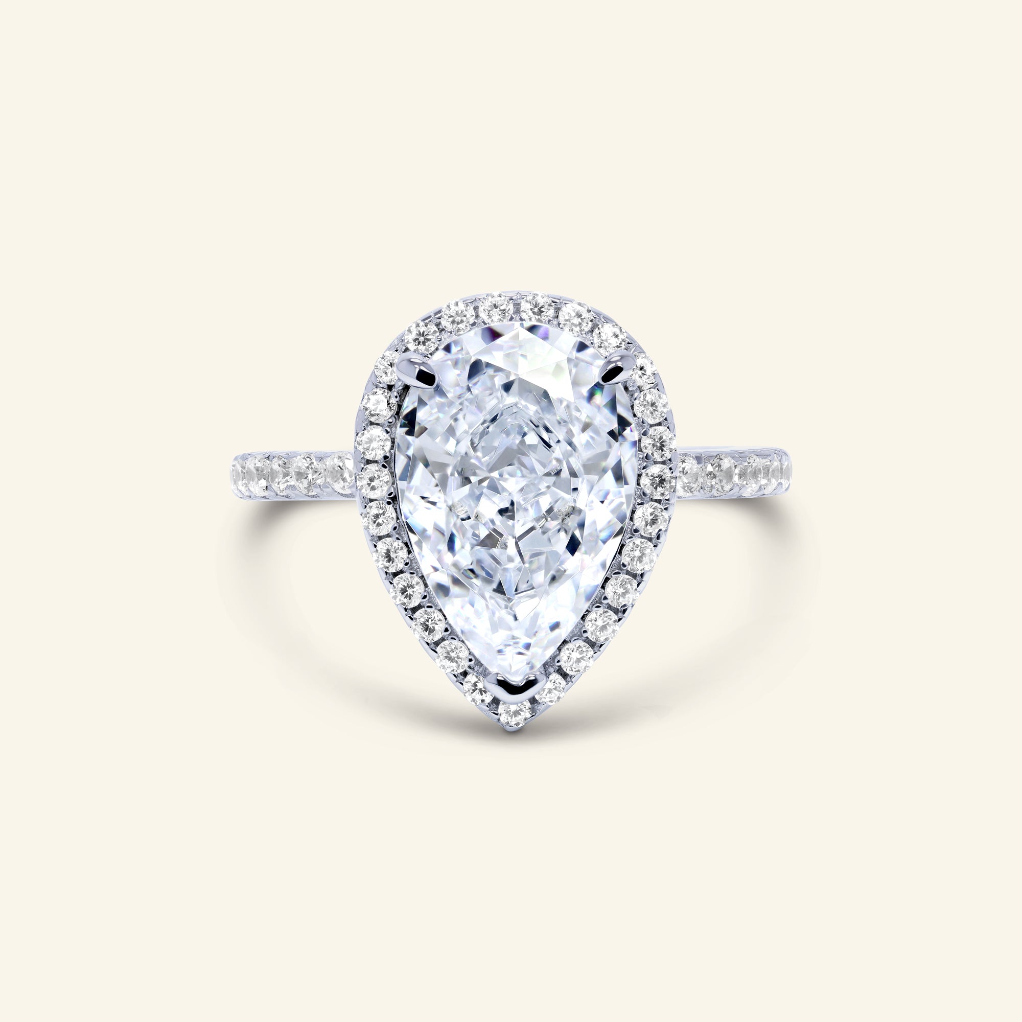 Delaney pear halo ring with pavé band by Arvion Jewelry