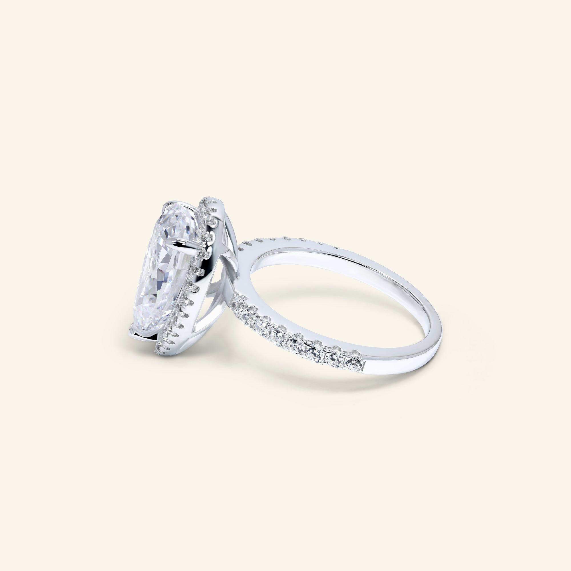 Delaney pear halo ring with pavé band by Arvion Jewelry