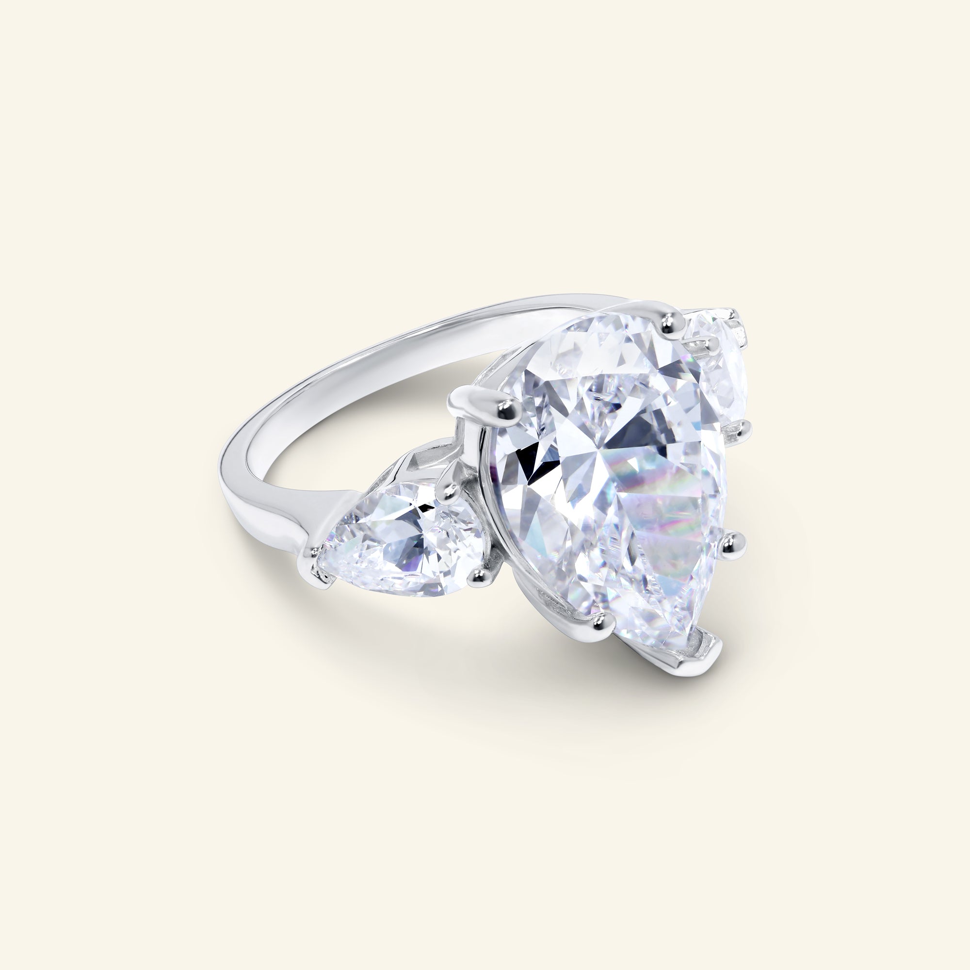 Sora three-stone pear ring with pear side stones by Arvion Jewelry