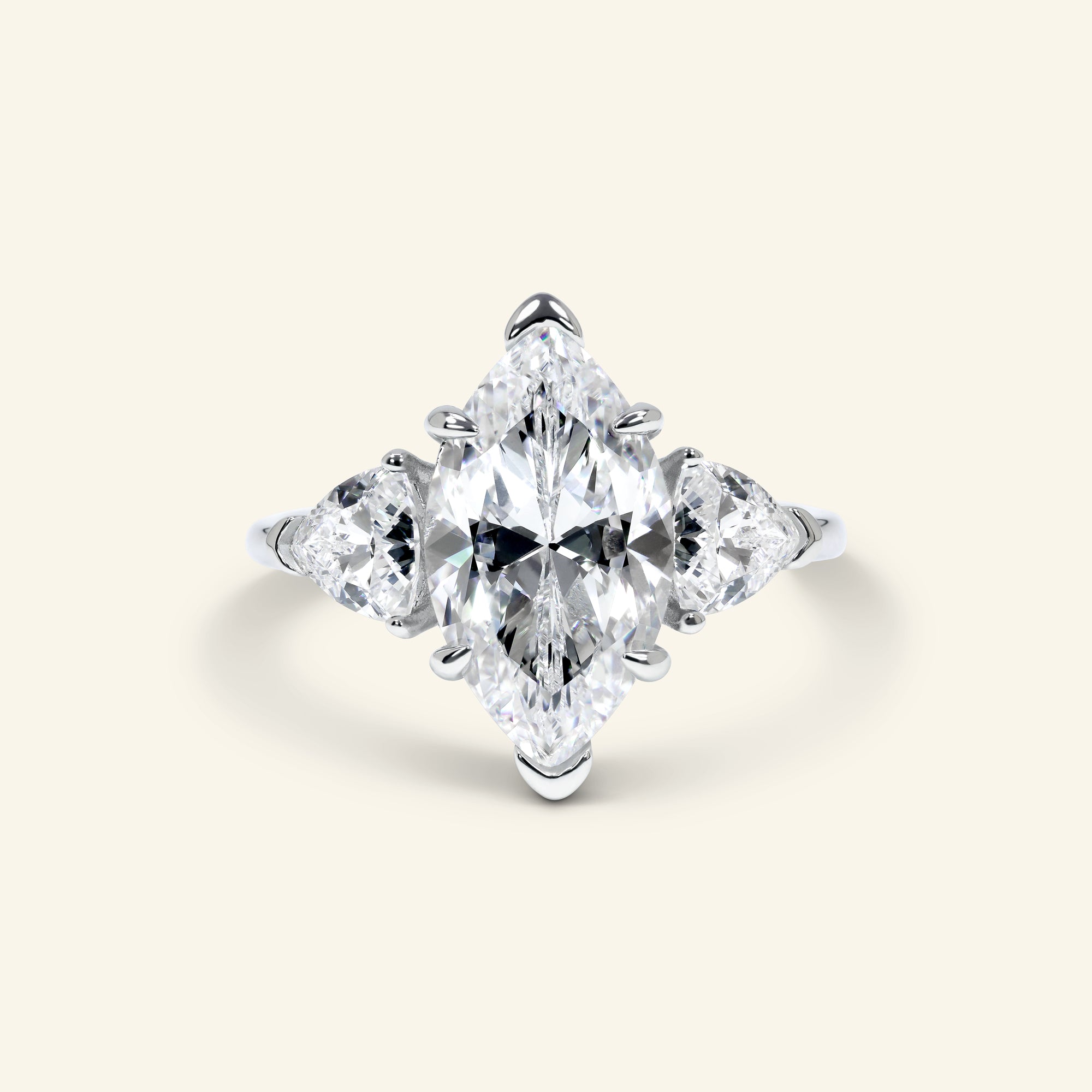 Maristelle marquise three stone ring by Arvion Jewelry